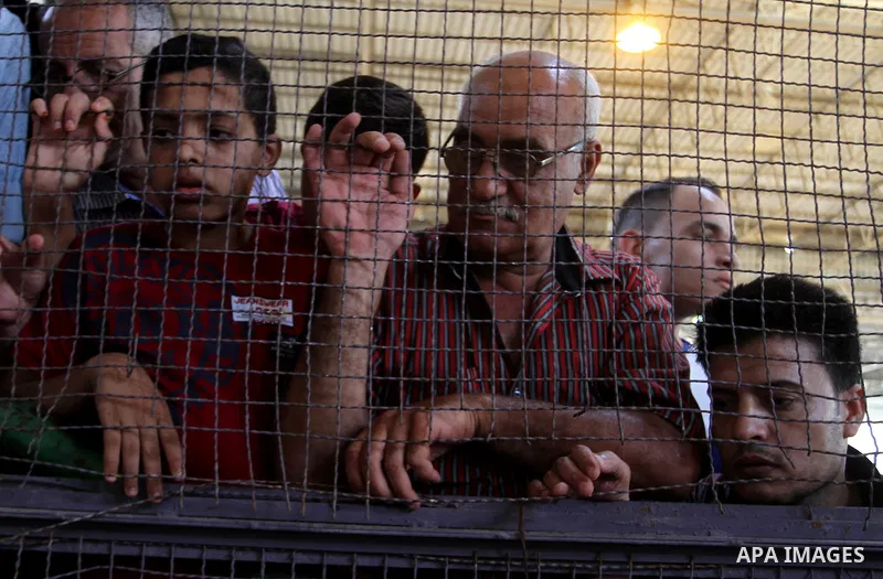 Palestinians wait for a travel permit to cross into Egypt through the Rafah border crossing after it was opened by Egyptian authorities for five days, in the southern Gaza Strip June 30, 2016. Photo by Abed Rahim Khatib