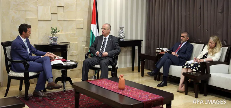 Palestinian Prime Minister, Rami Hamadallah, meets with Denmark representative of the Palestine Andreas Freiburg, in the West Bank city of Ramallah, on June 30, 2016. Photo by Prime Minister Office