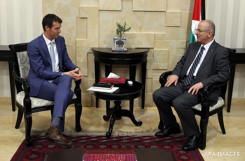 Palestinian Prime Minister, Rami Hamadallah, meets with Denmark representative of the Palestine Andreas Freiburg, in the West Bank city of Ramallah, on June 30, 2016. Photo by Prime Minister Office