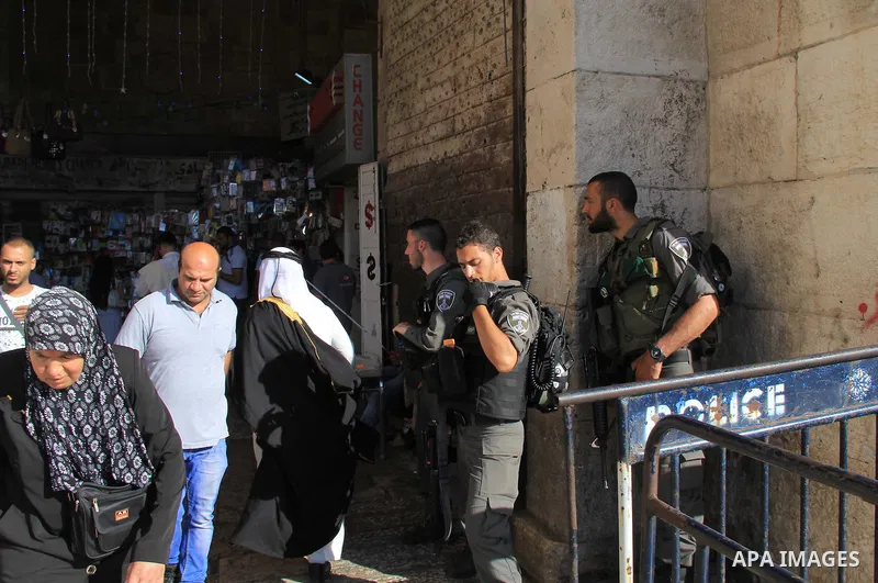 Israeli border police stand guard in Jerusalem's old city on June 30, 2016 during the holy fasting month of Ramadan. Photo by Mahfouz Abu Turk