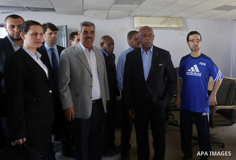 Chairman of the FIFA Monitoring Committee Israel-Palestine Tokyo Sexwale visits the headquarters of the Palestinian Football Association which witnesses said was damaged in past Israeli shelling, in the northern Gaza Str...