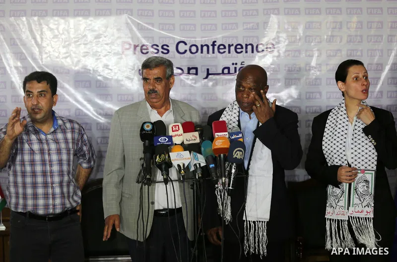 Chairman of the FIFA monitoring committee for Israel and Palestine, Tokyo Sexwale , speaks to the press following a visit to the Palestinian Football Association headquarters which witnesses said was damaged in past Isra...
