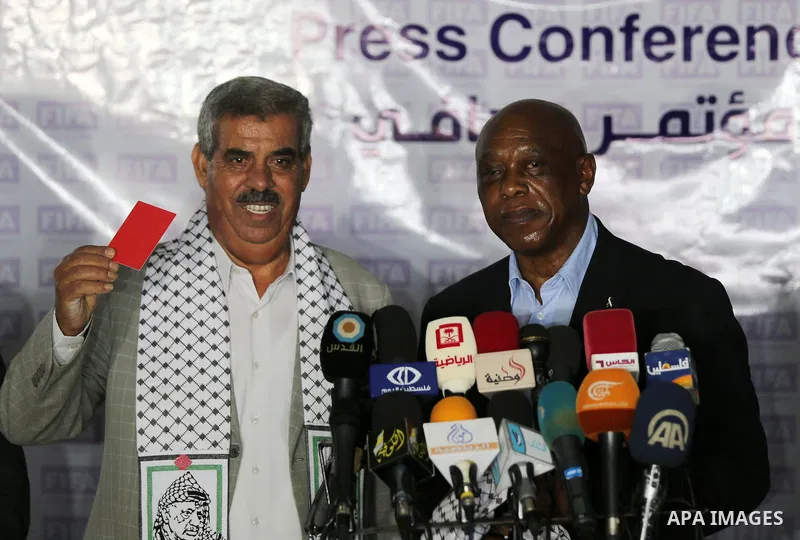 Chairman of the FIFA monitoring committee for Israel and Palestine, Tokyo Sexwale , speaks to the press following a visit to the Palestinian Football Association headquarters which witnesses said was damaged in past Isra...