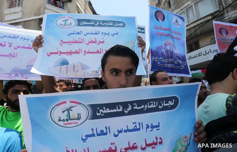 Palestinians take part in a rally marking al-Quds (Jerusalem) Day following Friday prayer in Gaza city on July 1, 2016. Photo by Mohammed Asad