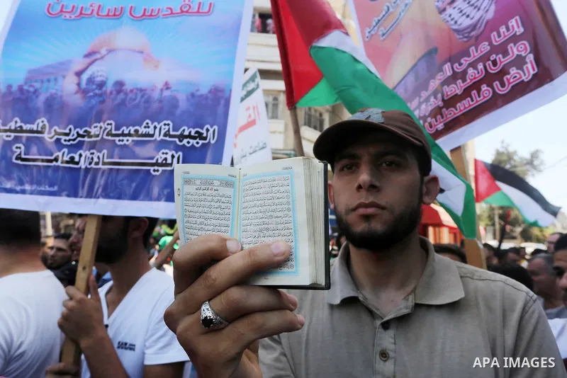 Palestinians take part in a rally marking al-Quds (Jerusalem) Day following Friday prayer in Gaza city on July 1, 2016. Photo by Mohammed Asad