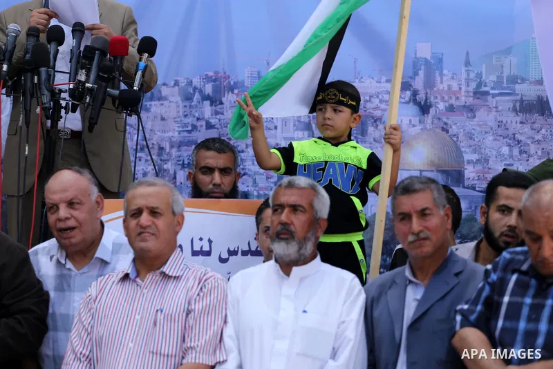 Palestinians take part in a rally marking al-Quds (Jerusalem) Day following Friday prayer in Gaza city on July 1, 2016. Photo by Mohammed Asad