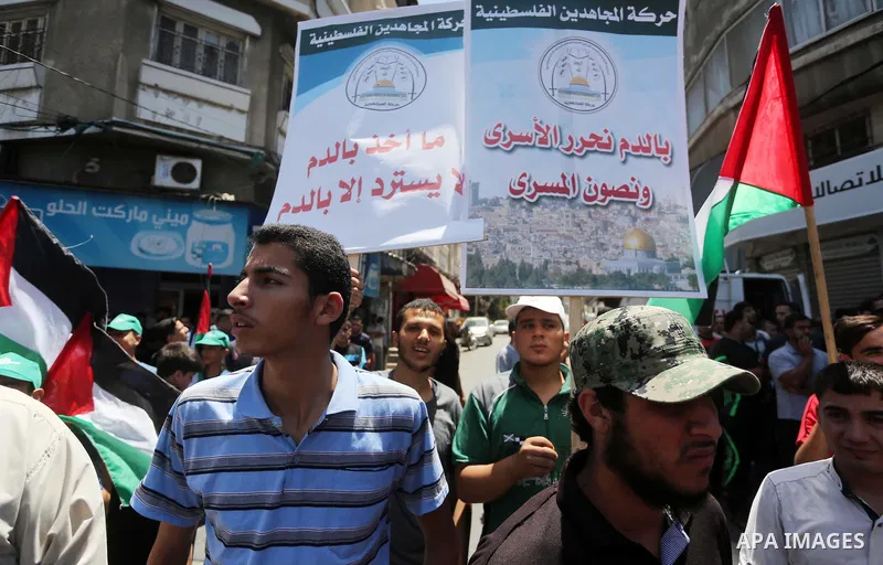Palestinians take part in a rally marking al-Quds (Jerusalem) Day following Friday prayer in Gaza city on July 1, 2016. Photo by Mohammed Asad