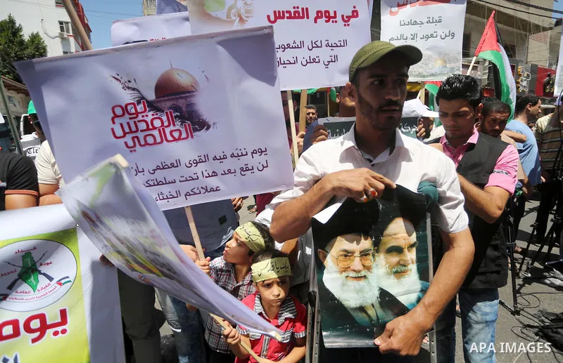 Palestinians take part in a rally marking al-Quds (Jerusalem) Day following Friday prayer in Gaza city on July 1, 2016. Photo by Mohammed Asad