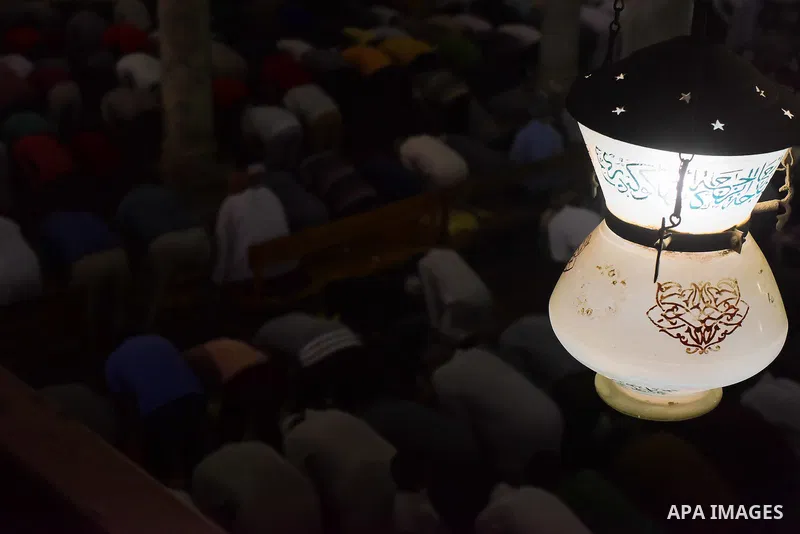 Egyptian muslim worshipers take part in Laylat Al Qadr prayers or Night of Power, in which the Muslim holy book of Koran was revealed to Prophet Mohammad by Allah on the 27th day of the holy fasting month of Ramadan at A...