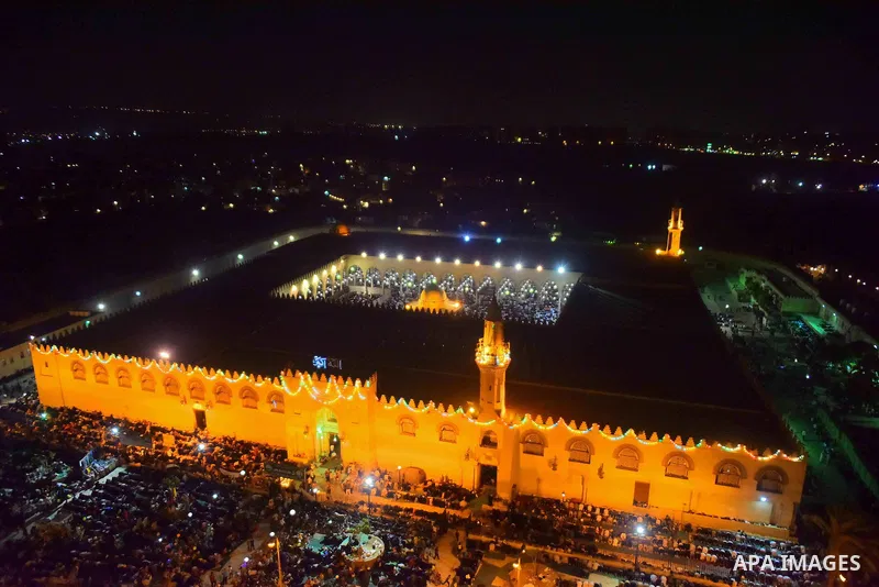 Egyptian muslim worshipers take part in Laylat Al Qadr prayers or Night of Power, in which the Muslim holy book of Koran was revealed to Prophet Mohammad by Allah on the 27th day of the holy fasting month of Ramadan at A...