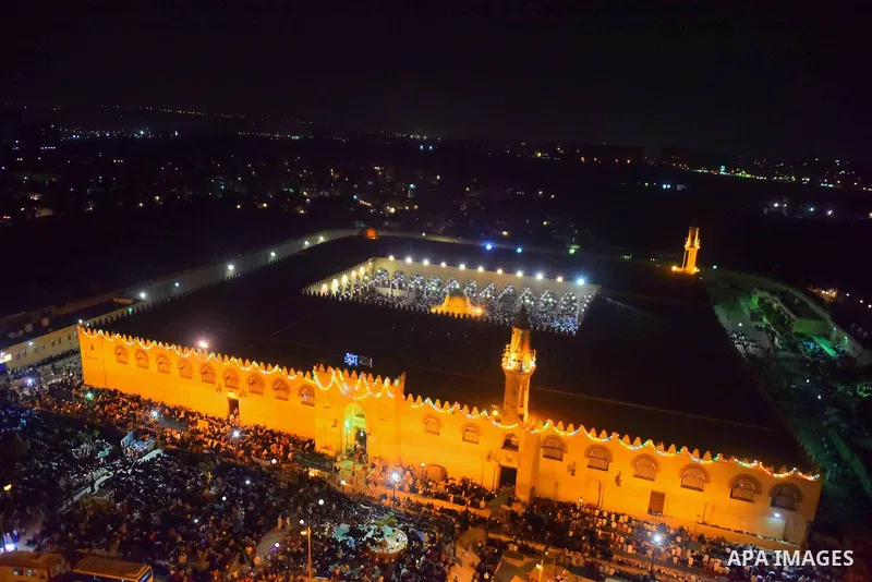 Egyptian muslim worshipers take part in Laylat Al Qadr prayers or Night of Power, in which the Muslim holy book of Koran was revealed to Prophet Mohammad by Allah on the 27th day of the holy fasting month of Ramadan at A...