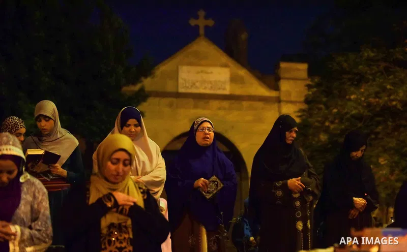 Egyptian muslim worshipers take part in Laylat Al Qadr prayers or Night of Power, in which the Muslim holy book of Koran was revealed to Prophet Mohammad by Allah on the 27th day of the holy fasting month of Ramadan at A...