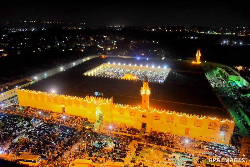 Egyptian muslim worshipers take part in Laylat Al Qadr prayers or Night of Power, in which the Muslim holy book of Koran was revealed to Prophet Mohammad by Allah on the 27th day of the holy fasting month of Ramadan at A...