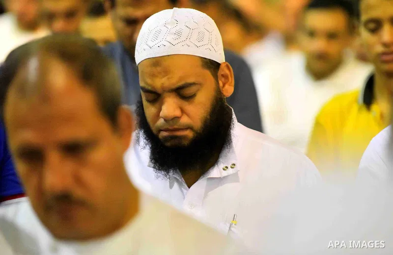 Egyptian muslim worshipers take part in Laylat Al Qadr prayers or Night of Power, in which the Muslim holy book of Koran was revealed to Prophet Mohammad by Allah on the 27th day of the holy fasting month of Ramadan at A...