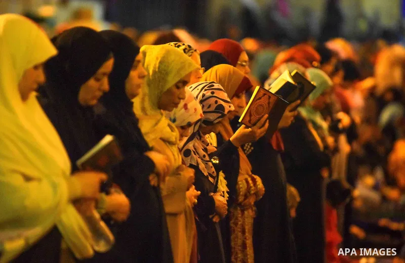 Egyptian muslim worshipers take part in Laylat Al Qadr prayers or Night of Power, in which the Muslim holy book of Koran was revealed to Prophet Mohammad by Allah on the 27th day of the holy fasting month of Ramadan at A...