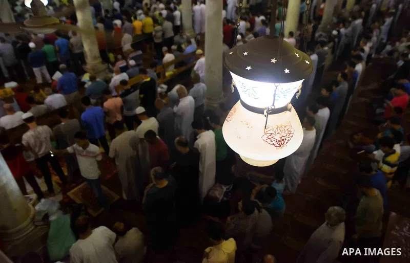 Egyptian muslim worshipers take part in Laylat Al Qadr prayers or Night of Power, in which the Muslim holy book of Koran was revealed to Prophet Mohammad by Allah on the 27th day of the holy fasting month of Ramadan at A...