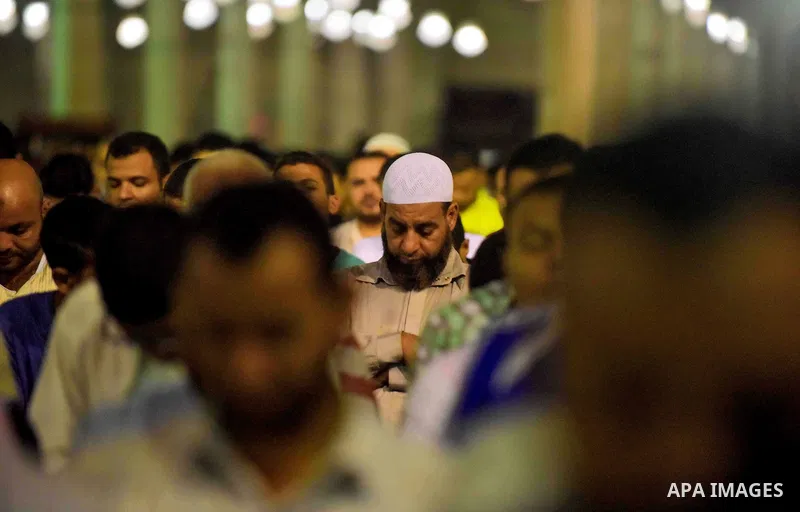 Egyptian muslim worshipers take part in Laylat Al Qadr prayers or Night of Power, in which the Muslim holy book of Koran was revealed to Prophet Mohammad by Allah on the 27th day of the holy fasting month of Ramadan at A...