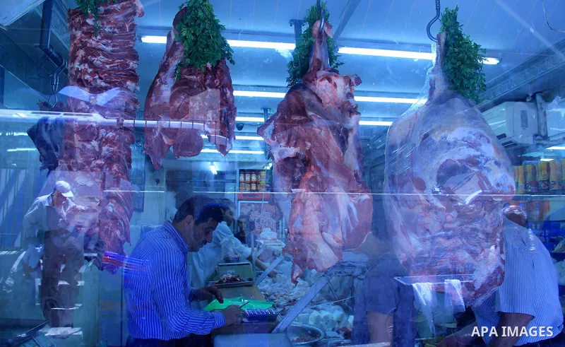 Palestinians shop at a market ahead of the Eid al-Fitr holiday, in Jerusalem old city, on July 3, 2016. Eid al-Fitr marks the end of Muslim's holy fasting month of Ramadan when faithfuls abstain from eating, drinking, sm...