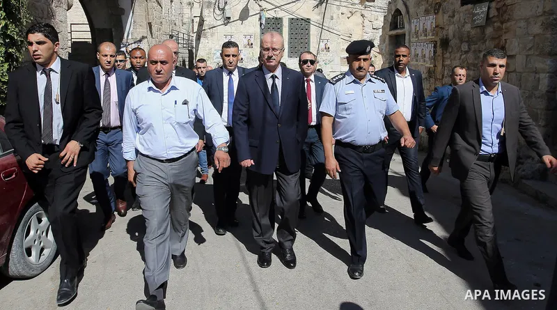 Palestinian Prime Minister Rami Hamdallah visits the mourning tent of Tayseer Habash, who died from tear gas fired by Israeli security forces during clashes, in the West Bank city of Nablus, on July 03, 2016. Photo by Pr...