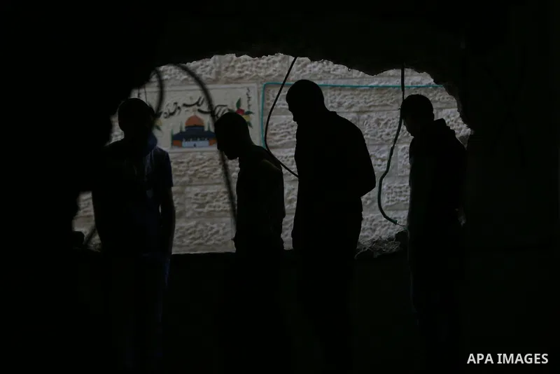 Palestinians inspect the damaged house of Issa Assaf, which was demolished by the Israeli army, in the West Bank refugee camp of Qalandia, at the outskirts of Ramallah, Monday, July 4, 2016. The Israeli army demolished t...