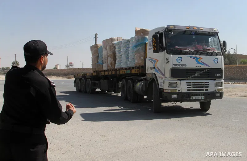A truck loaded with aid parcels provided by Turkey is parked at Kerem Shalom crossing between Israel and southern Gaza Strip July 4, 2016. A Turkish ship carrying aid for Gaza arrived in Israel on July 3, a week after th...