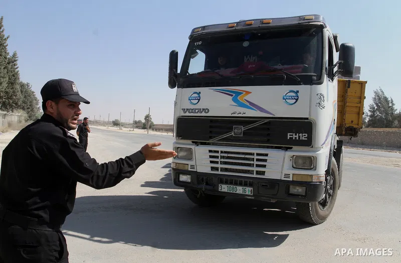 A truck loaded with aid parcels provided by Turkey is parked at Kerem Shalom crossing between Israel and southern Gaza Strip July 4, 2016. A Turkish ship carrying aid for Gaza arrived in Israel on July 3, a week after th...