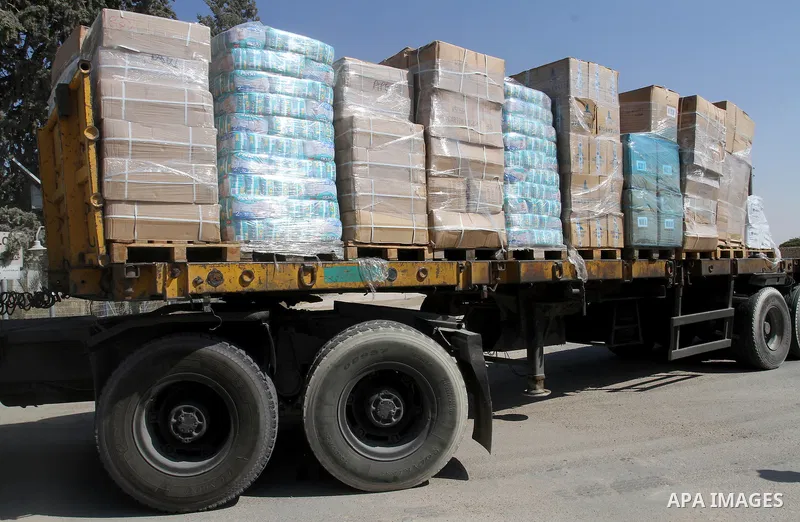A truck loaded with aid parcels provided by Turkey is parked at Kerem Shalom crossing between Israel and southern Gaza Strip July 4, 2016. A Turkish ship carrying aid for Gaza arrived in Israel on July 3, a week after th...