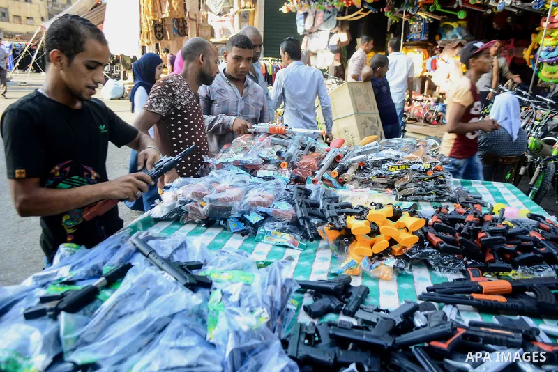 Egyptians shop at market ahead of the Eid al-Fitr holiday in Cairo, Egypt, on July 04, 2016, as Muslims the world over prepare to celebrate Eid al-Fitr, starting with the with the sighting of the new moon, to mark the en...