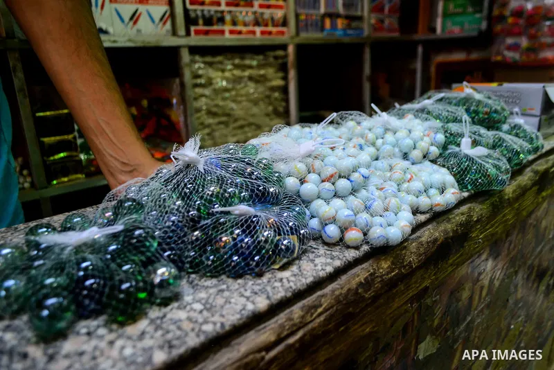 Egyptians shop at market ahead of the Eid al-Fitr holiday in Cairo, Egypt, on July 04, 2016, as Muslims the world over prepare to celebrate Eid al-Fitr, starting with the with the sighting of the new moon, to mark the en...