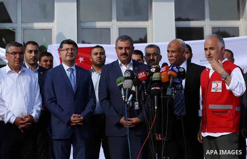 President of Turkish Red Crescent Kerem Kinik speaks during a press conference after humanitarian aid parcels provided by Turkey entered the southern Gaza Strip from Israel through the Kerem Shalom crossing July 4, 2016....