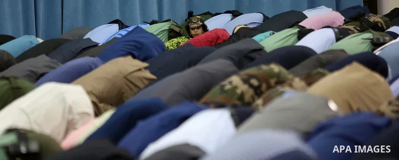 Palestinians attend the morning prayers for Eid al-Fitr celebrations, which marks the end of the holy fasting month of Ramadan, in the West Bank city of Ramallah July 6, 2016. Photo by Shadi Hatem