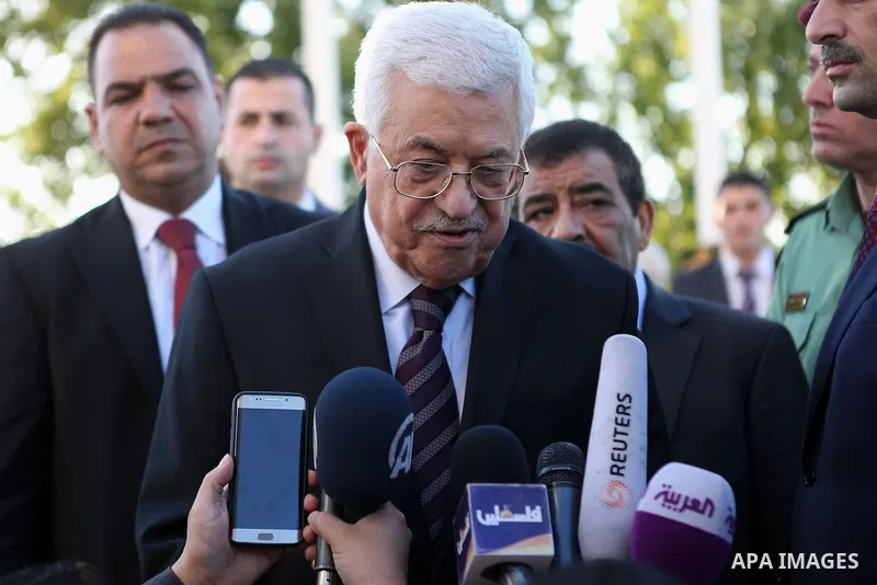 Palestinian President Mahmoud Abbas speaks to media following morning prayers for Eid al-Fitr celebrations, which marks the end of the holy fasting month of Ramadan, in the West Bank city of Ramallah July 6, 2016. Photo...