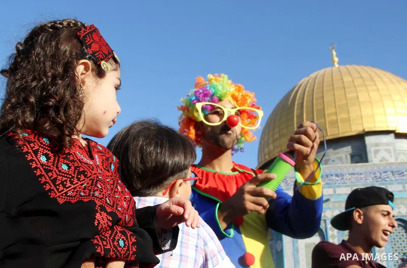 Palestinian Muslim after perform the morning Eid al-Fitr prayer near the Dome of Rock at the Al-Aqsa Mosque compound, Islam's third most holy site, in the old city of Jerusalem on July 6, 2016. Muslims worldwide celebrat...