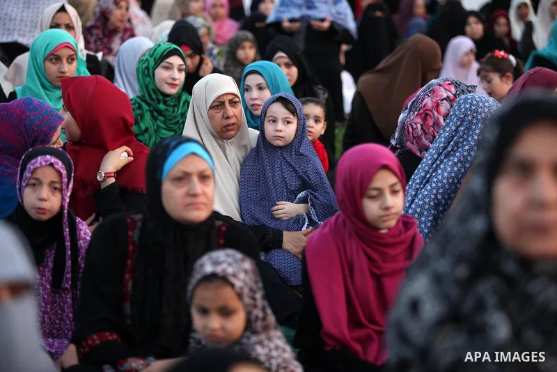 Palestinians attend the morning prayers for Eid al-Fitr celebrations, which marks the end of the holy fasting month of Ramadan, in Gaza City July 6, 2016. Photo by Ashraf Amra