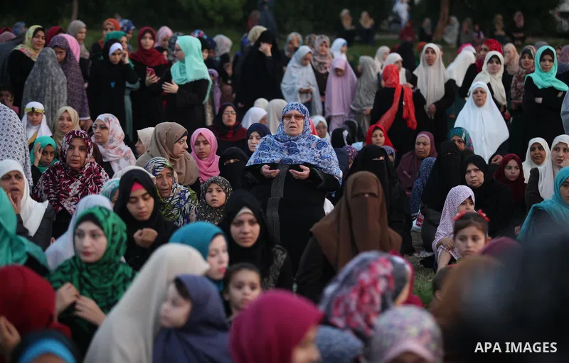 Palestinians attend the morning prayers for Eid al-Fitr celebrations, which marks the end of the holy fasting month of Ramadan, in Gaza City July 6, 2016. Photo by Ashraf Amra