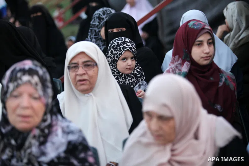 Palestinians attend the morning prayers for Eid al-Fitr celebrations, which marks the end of the holy fasting month of Ramadan, in Gaza City July 6, 2016. Photo by Ashraf Amra