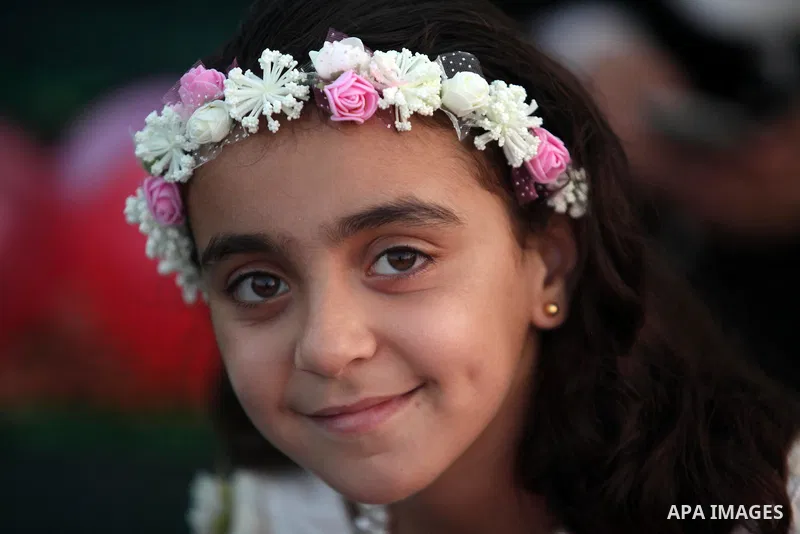Palestinians attend the morning prayers for Eid al-Fitr celebrations, which marks the end of the holy fasting month of Ramadan, in Gaza City July 6, 2016. Photo by Ashraf Amra