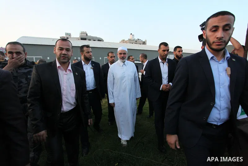 Senior Hamas leader Ismail Haniyeh leads the morning prayers for Eid al-Fitr celebrations, which marks the end of the holy fasting month of Ramadan, in Gaza City July 6, 2016. Photo by Ashraf Amra