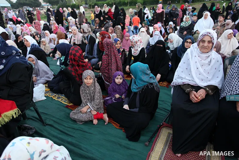 Palestinians attend the morning prayers for Eid al-Fitr celebrations, which marks the end of the holy fasting month of Ramadan, in Gaza City July 6, 2016. Photo by Ashraf Amra