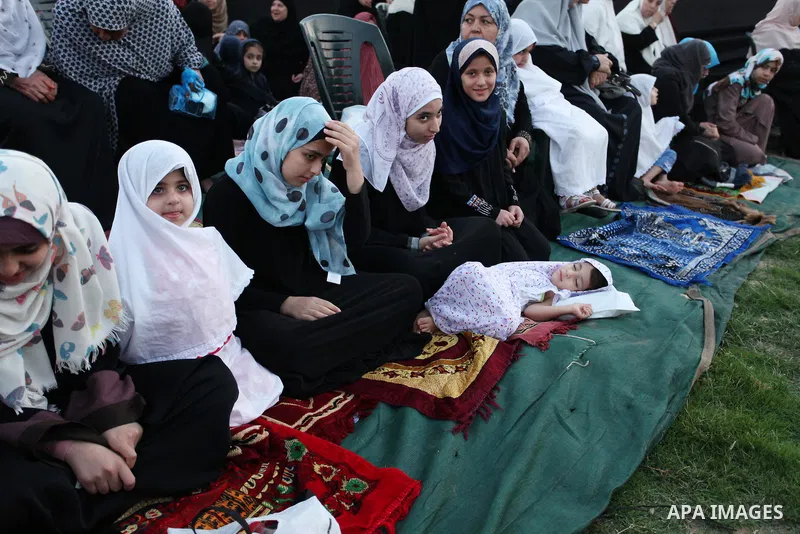 Palestinians attend the morning prayers for Eid al-Fitr celebrations, which marks the end of the holy fasting month of Ramadan, in Gaza City July 6, 2016. Photo by Ashraf Amra