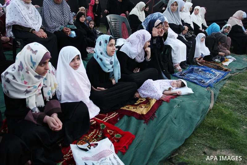 Palestinians attend the morning prayers for Eid al-Fitr celebrations, which marks the end of the holy fasting month of Ramadan, in Gaza City July 6, 2016. Photo by Ashraf Amra