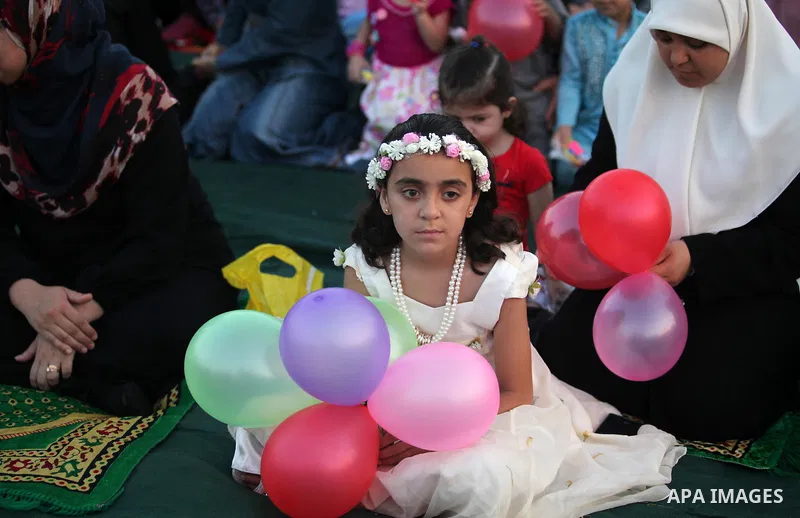 Palestinians attend the morning prayers for Eid al-Fitr celebrations, which marks the end of the holy fasting month of Ramadan, in Gaza City July 6, 2016. Photo by Ashraf Amra
