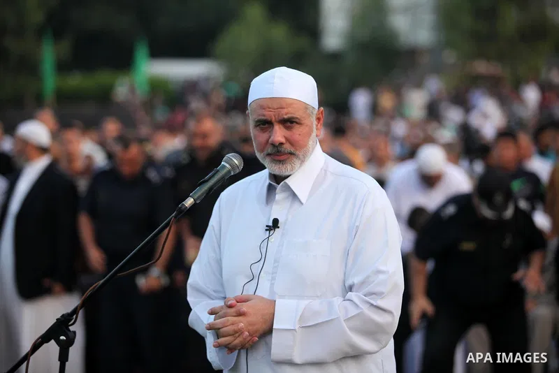 Senior Hamas leader Ismail Haniyeh leads the morning prayers for Eid al-Fitr celebrations, which marks the end of the holy fasting month of Ramadan, in Gaza City July 6, 2016. Photo by Ashraf Amra