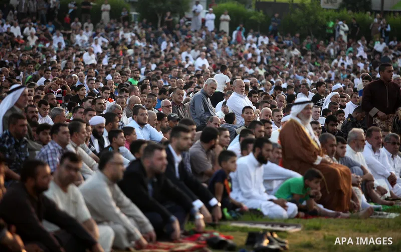 Palestinians attend the morning prayers for Eid al-Fitr celebrations, which marks the end of the holy fasting month of Ramadan, in Gaza City July 6, 2016. Photo by Ashraf Amra