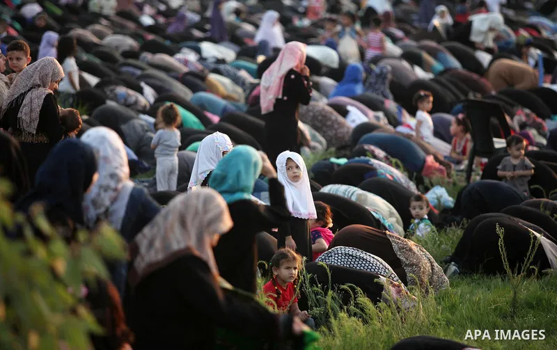 Palestinians attend the morning prayers for Eid al-Fitr celebrations, which marks the end of the holy fasting month of Ramadan, in Gaza City July 6, 2016. Photo by Ashraf Amra