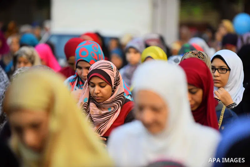 Egyptian Muslims attend the morning prayers for Eid al-Fitr celebrations, which marks the end of the holy fasting month of Ramadan, outside Amr Ibn El-Aas mosque, in Cairo, Egypt, on July 06, 2016. Photo by Amr Sayed