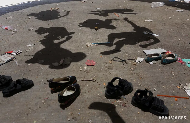 Palestinian children play on the second day of of Eid al-Fitr celebrations, which marks the end of the holy fasting month of Ramadan, at the al-Shati refugee camp in Gaza City on July 7, 2016. Photo by Mohammed Asad