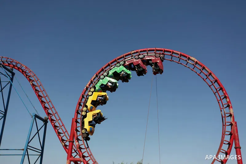 Palestinians take a ride at an amusement park on the third day of Eid al-Fitr holiday which marks the end of the Muslim holy month of Ramadan, in Gaza City on July 08, 2016. Photo by Ashraf Amra