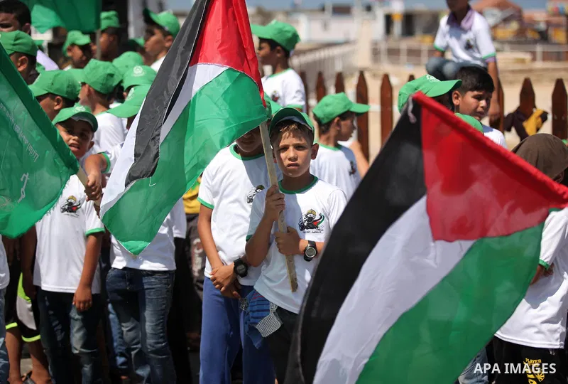Palestinian children take part in a summer camp organized by Hamas movement in Gaza city on July 10, 2016. Hamas movement organized dozens of summer camps for Palestinian children during the period of school holidays. Ph...