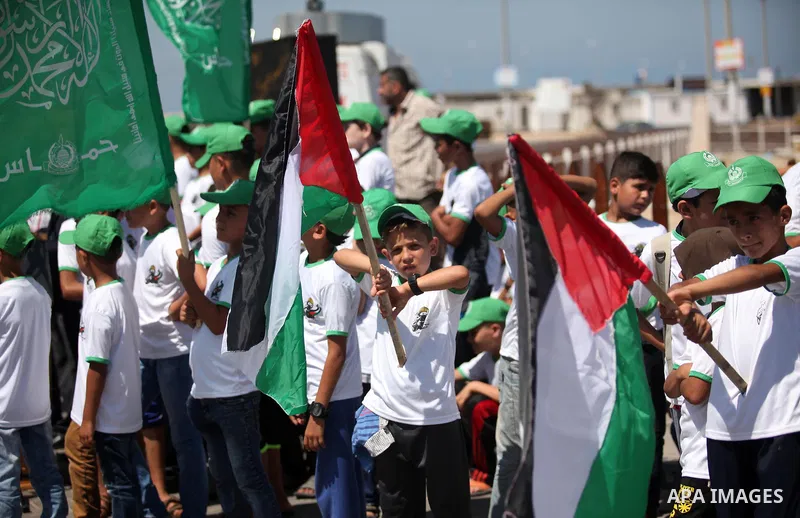 Palestinian children take part in a summer camp organized by Hamas movement in Gaza city on July 10, 2016. Hamas movement organized dozens of summer camps for Palestinian children during the period of school holidays. Ph...